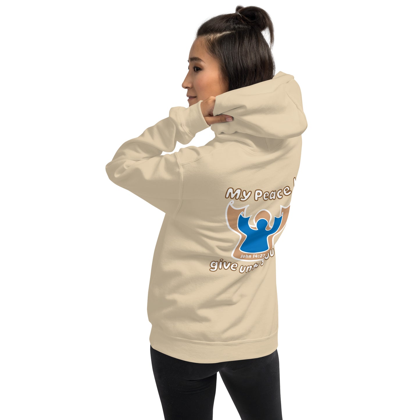 female wears sand beige my peace I give unto you hoodie with a blue angel and beige angel design on the back hood up
