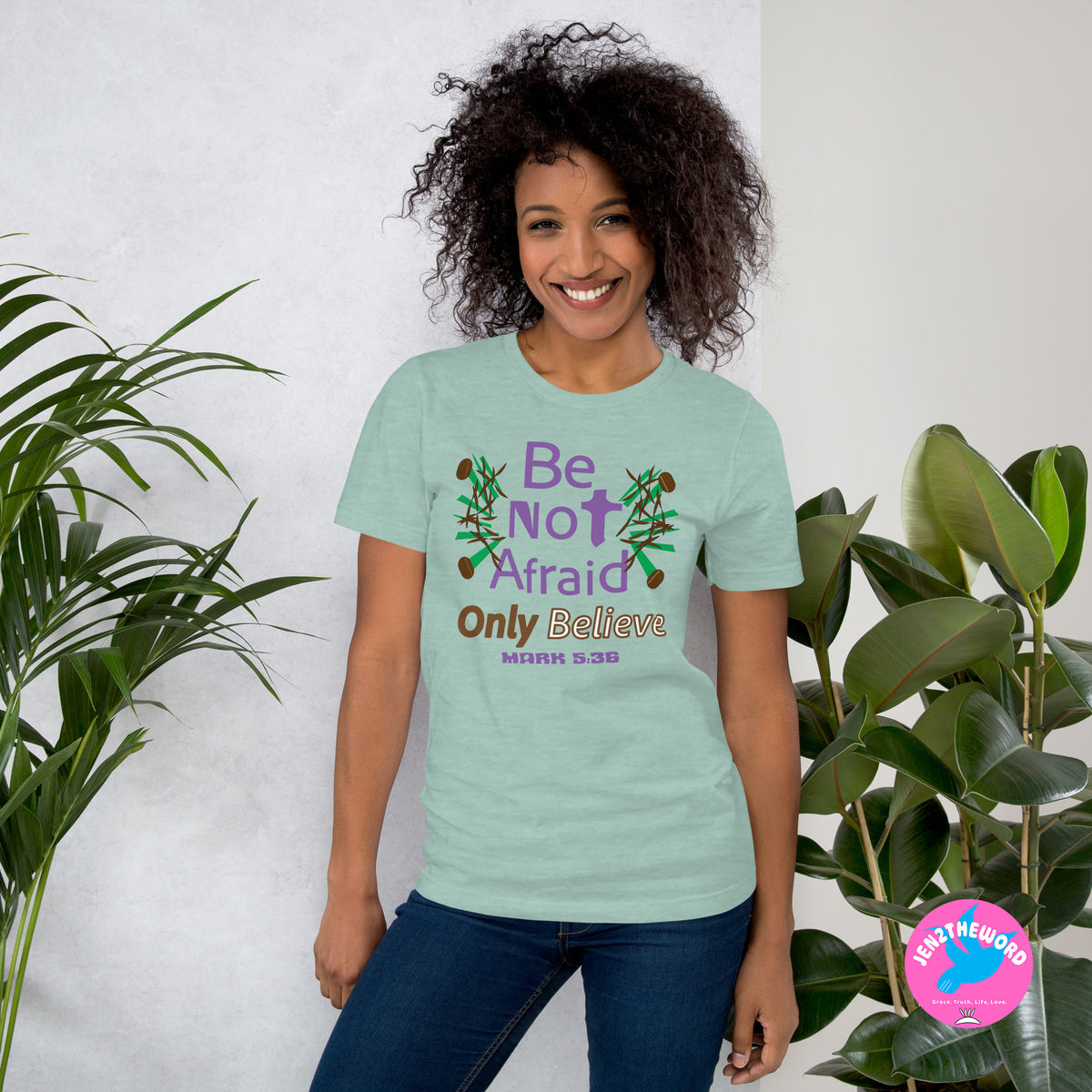 Female wearing a Heather Prism Dusty Blue Christian unisex t-shirt for teens, men and women be not afraid