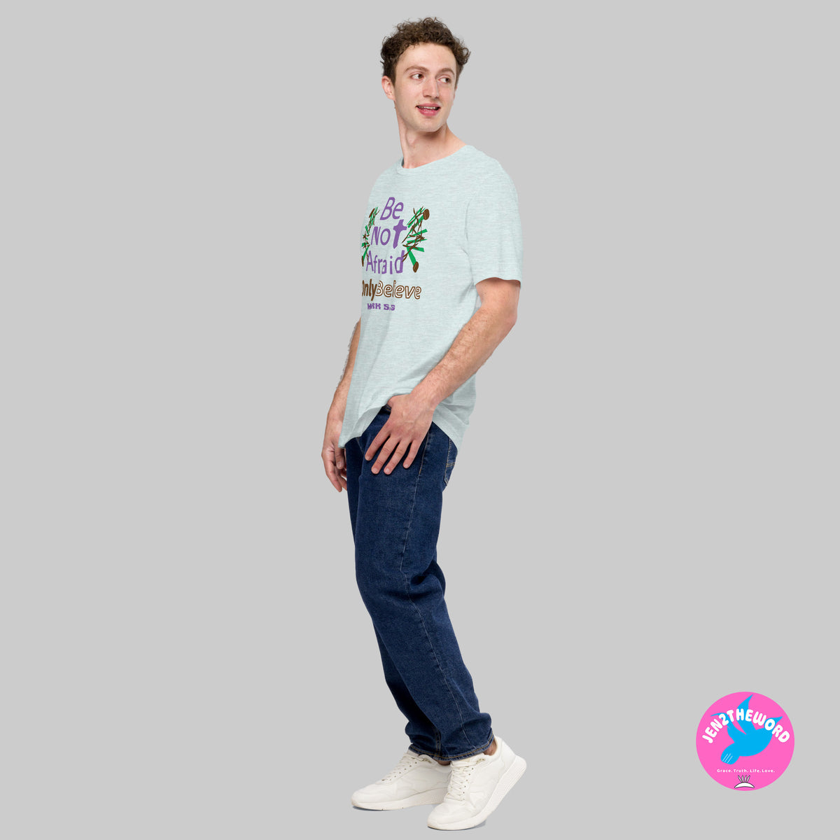 Male wearing a Heather Prism Ice Blue Christian unisex t-shirt for teens, men and women be not afraid