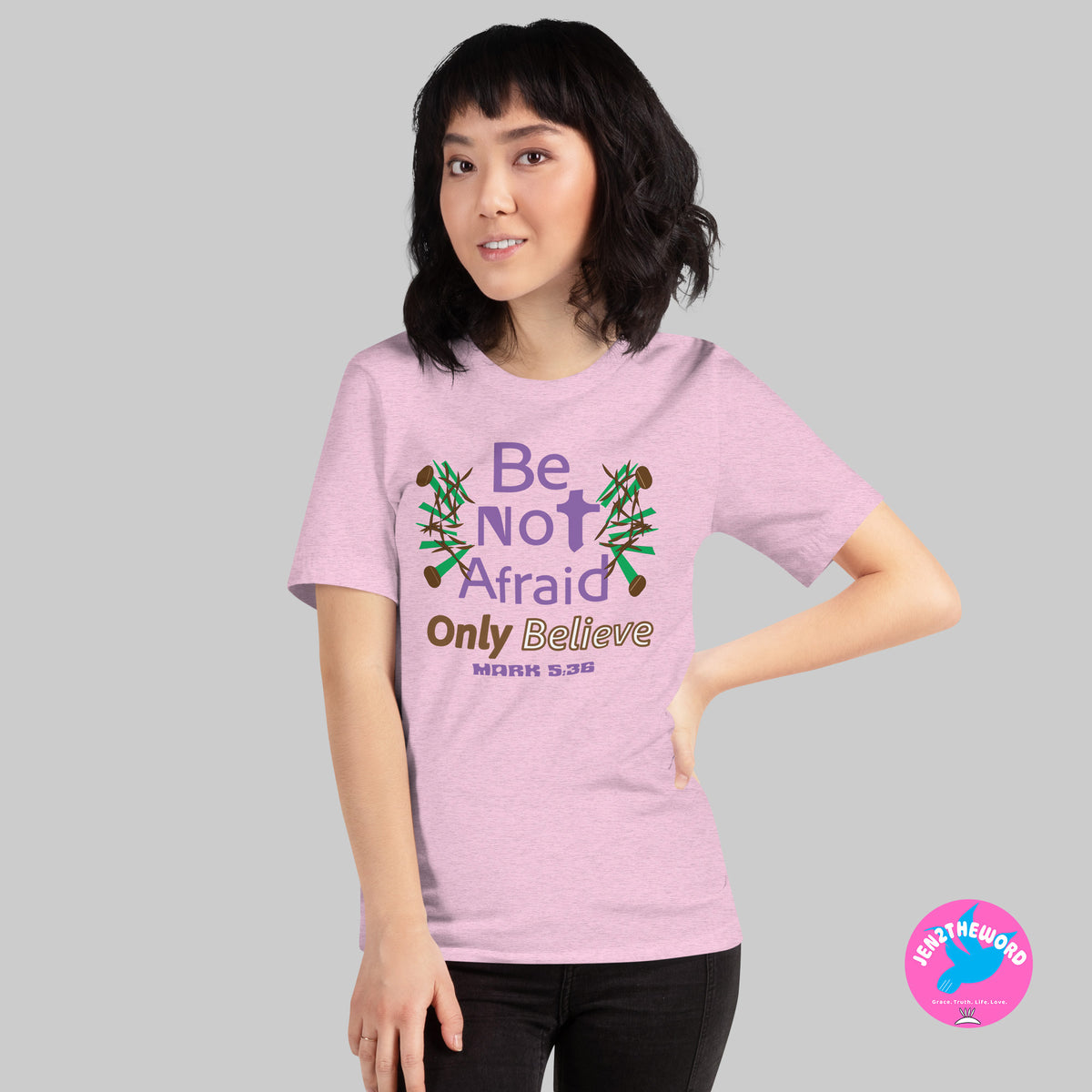 Female wearing a Heather Prism Lilac Christian unisex t-shirt for teens, men and women be not afraid