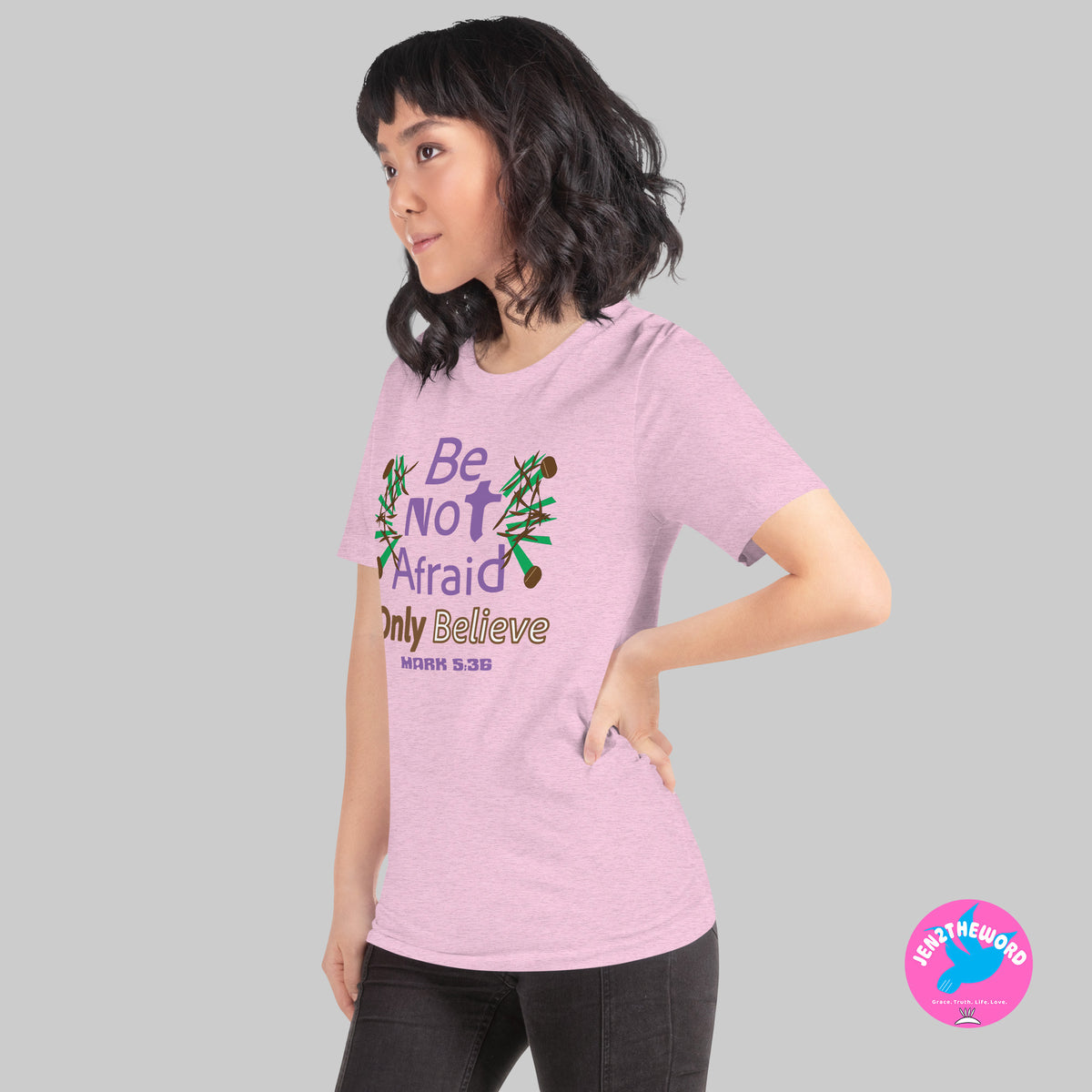 Female wearing a Heather Prism Lilac Christian unisex t-shirt for teens, men and women be not afraid