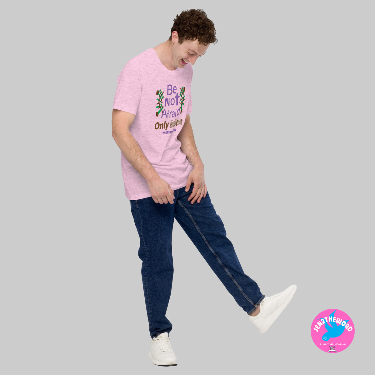 Male wearing a Heather Prism Lilac Christian unisex t-shirt for teens, men and women be not afraid