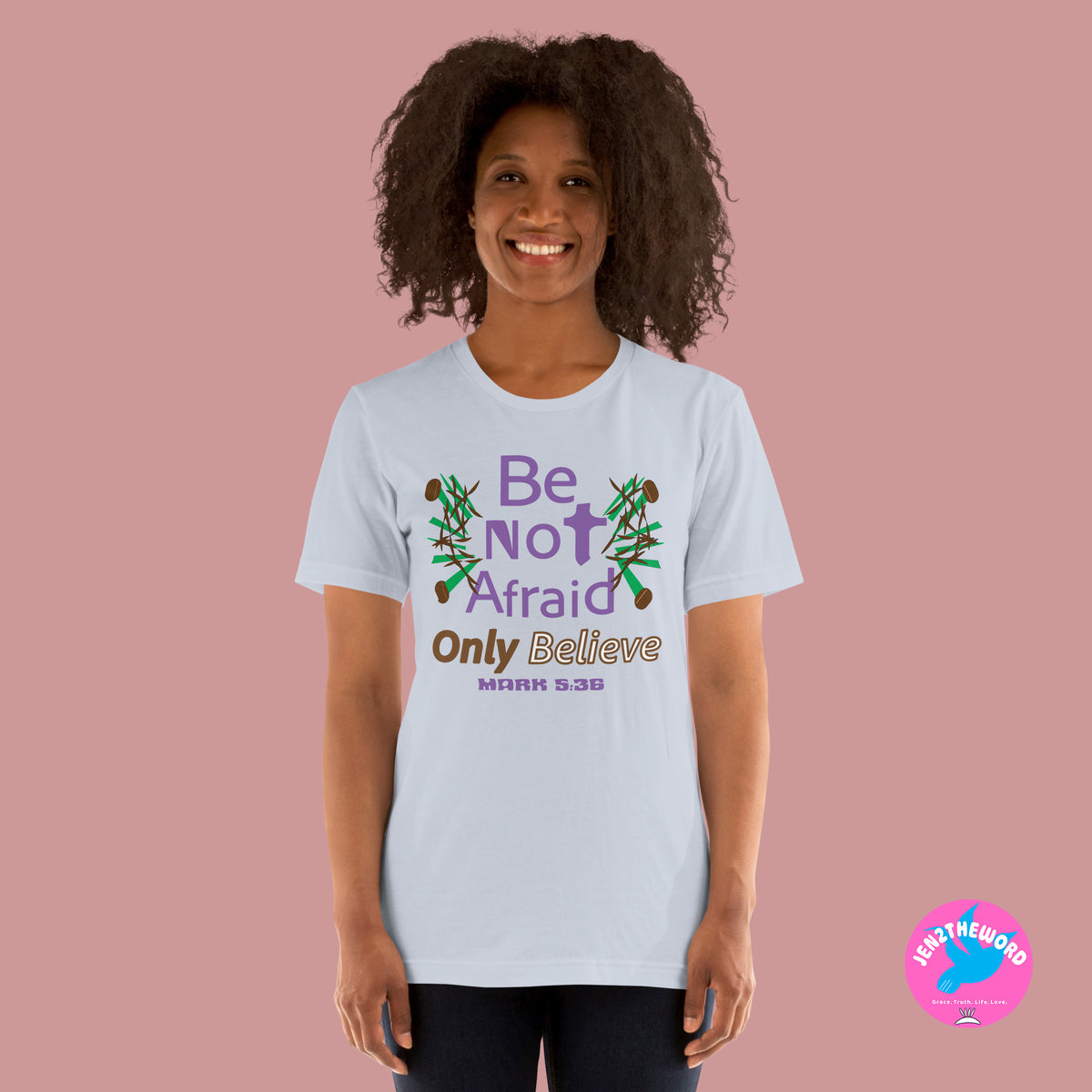 Female wearing a Light Blue Christian unisex t-shirt for teens, men and women be not afraid