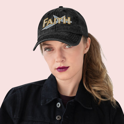 Female wearing a black cap with 'FAITH' embroidery on a pink background