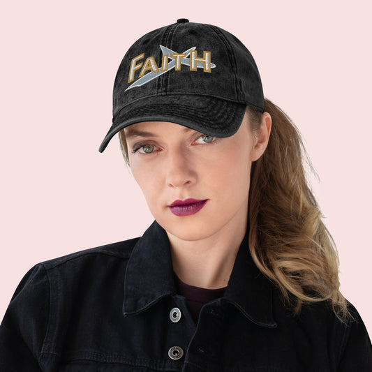 Female wearing a black cap with 'FAITH' embroidery on a pink background