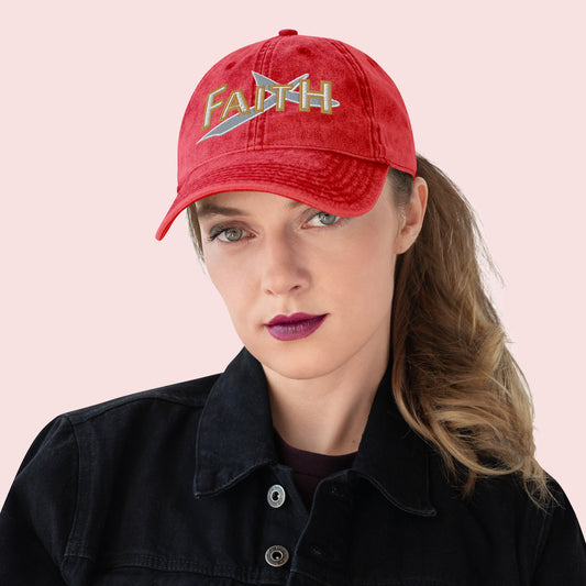 Female wearing a red cap with 'FAITH' text on a light pink background